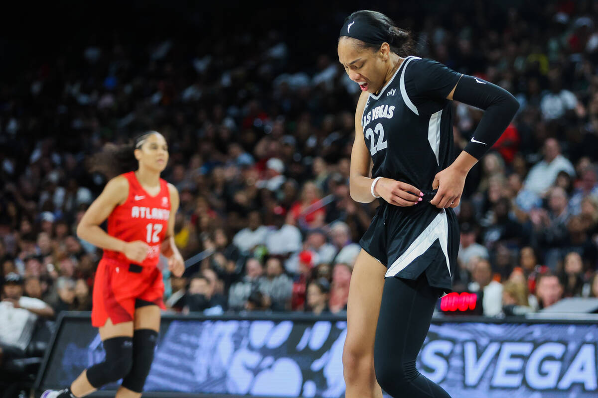 Aces center A'ja Wilson (22) makes her way back into the game after injuring her leg during a W ...