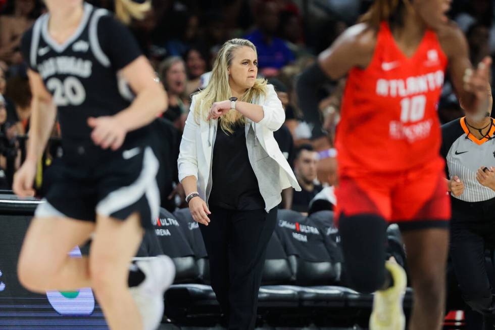 Aces head coach Becky Hammon coaches from the sidelines during a WNBA basketball game between t ...