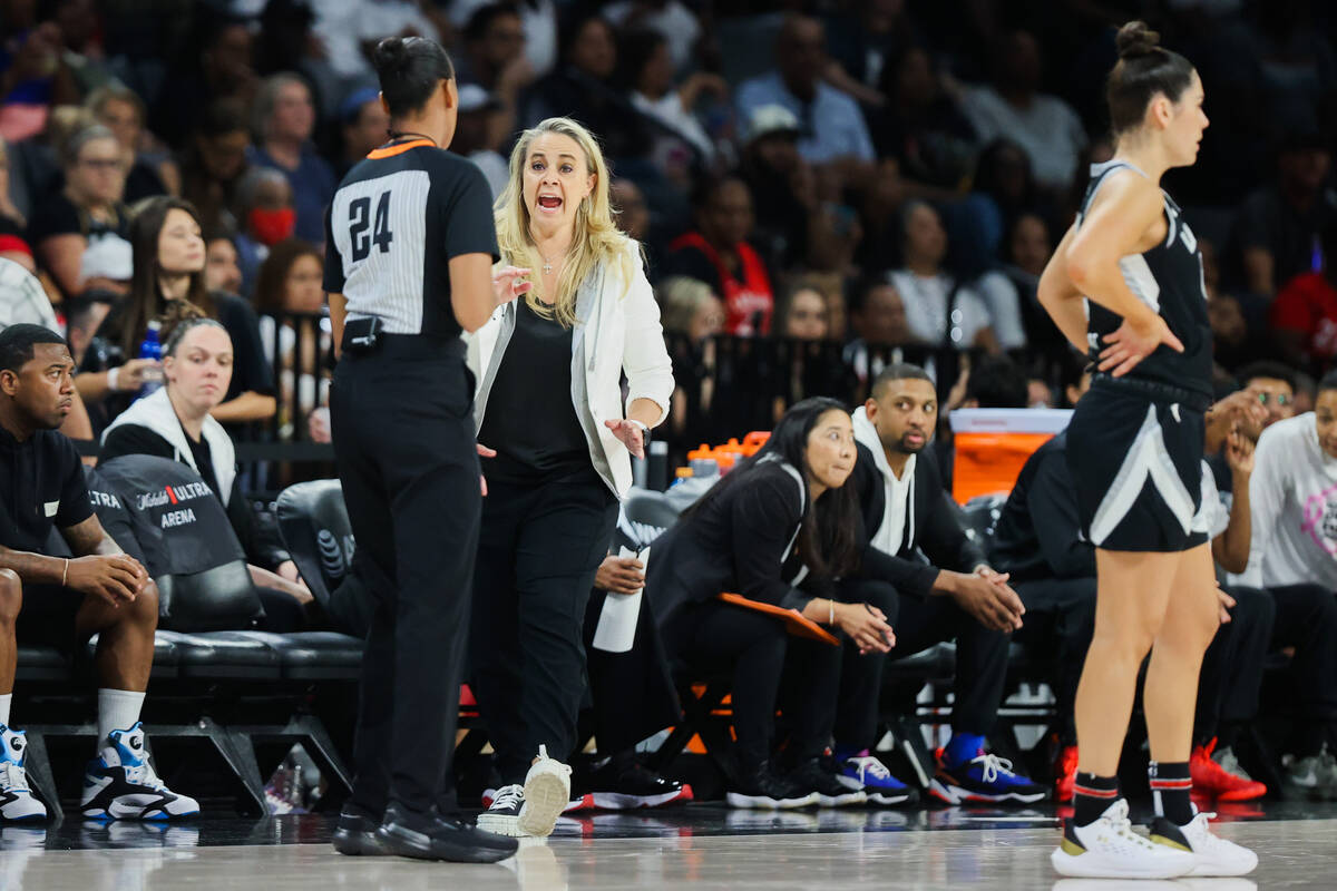 Aces head coach Becky Hammon speaks to a referee during a WNBA basketball game between the Las ...