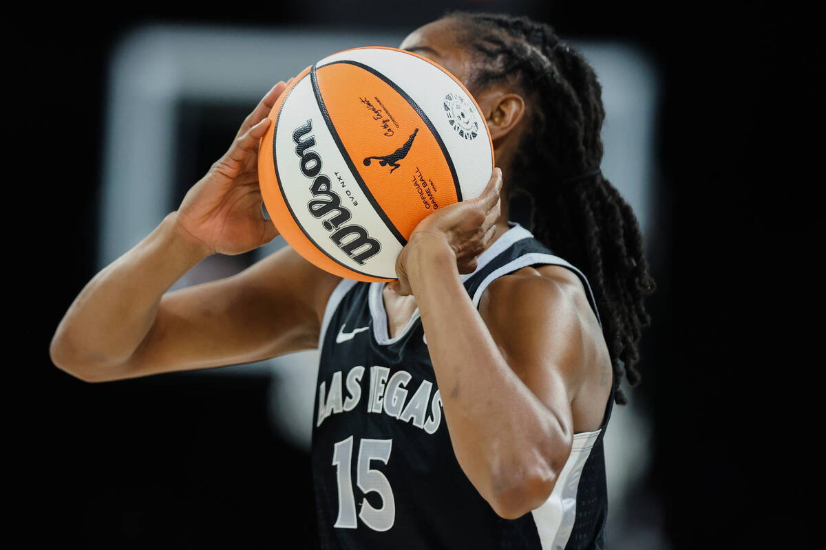 Aces guard Tiffany Hayes (15) passes the ball to a teammate during a WNBA basketball game betwe ...