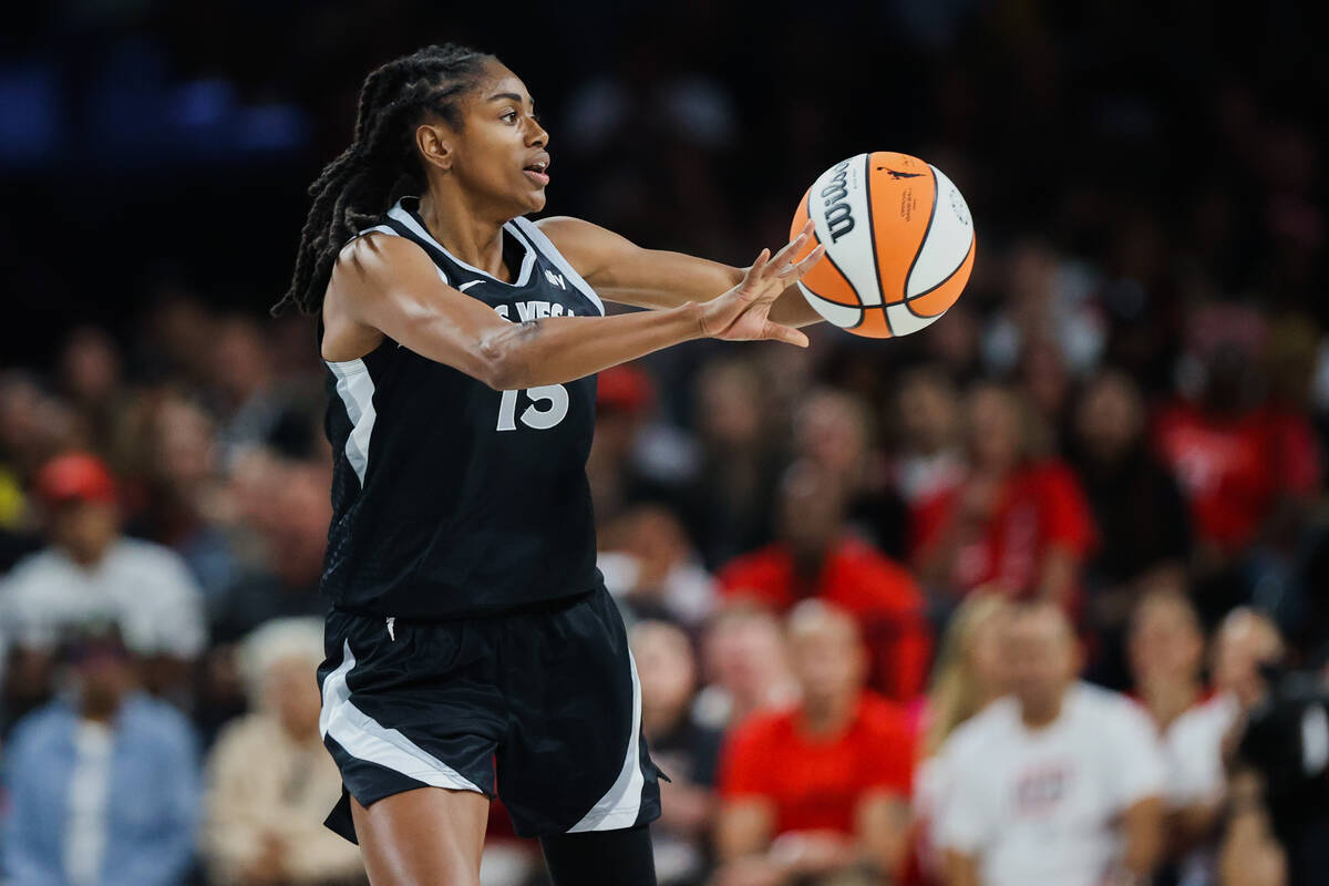 Aces guard Tiffany Hayes (15) passes the ball to a teammate during a WNBA basketball game betwe ...