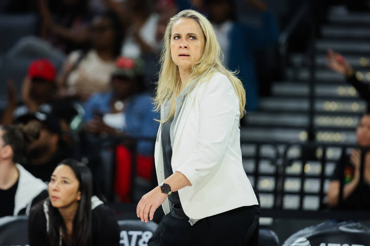 Aces head coach Becky Hammon coaches from the sidelines during a WNBA basketball game between t ...