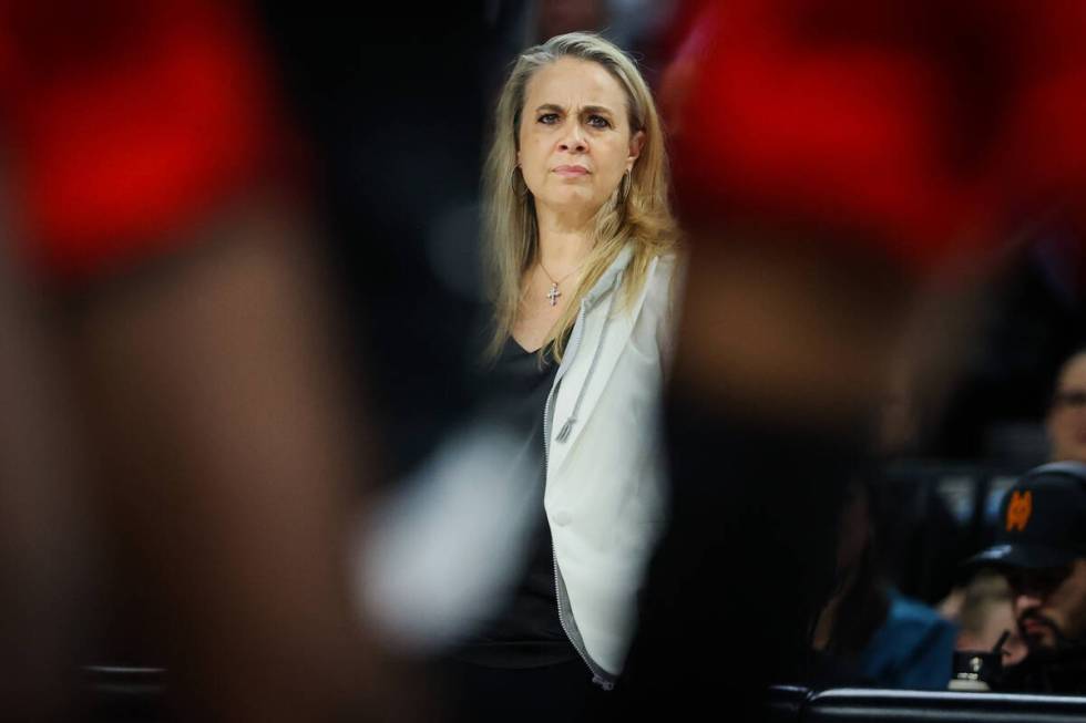 Aces head coach Becky Hammon coaches from the sidelines during a WNBA basketball game between t ...