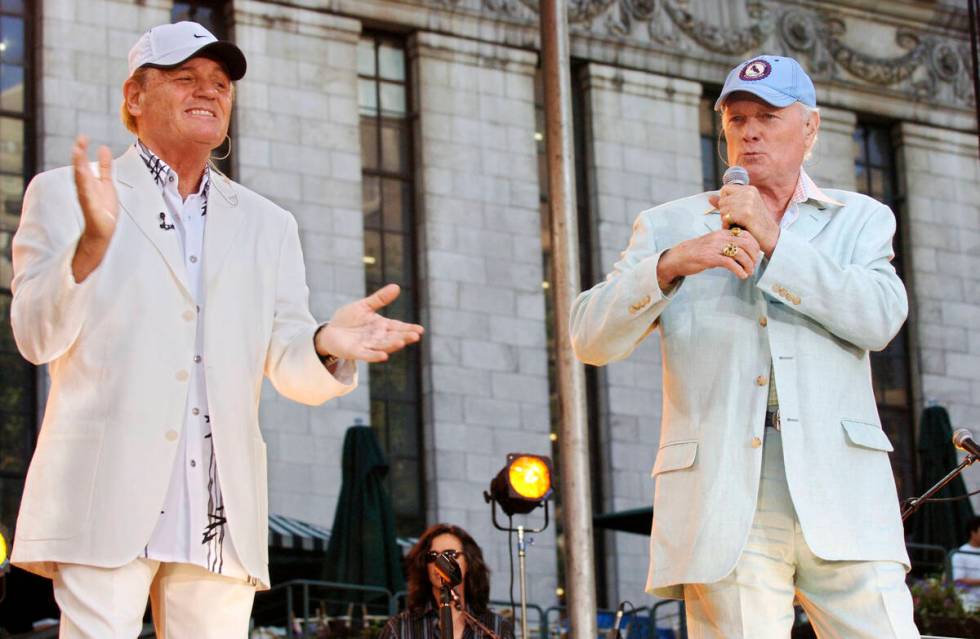 Beach Boys veteran Bruce Johnston, left, and founding member Mike Love perform on ABC's " ...