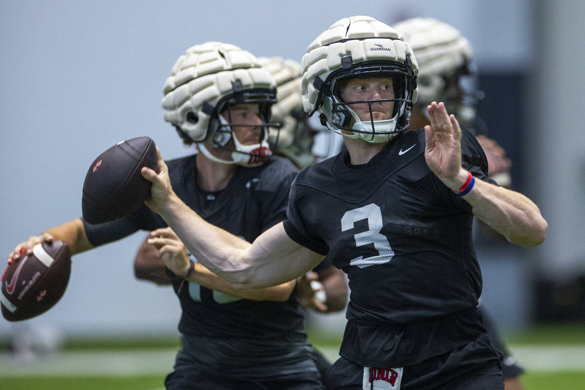 UNLV quarterback Matthew Sluka (3) eyes a receiver during football practice at the Intermountai ...