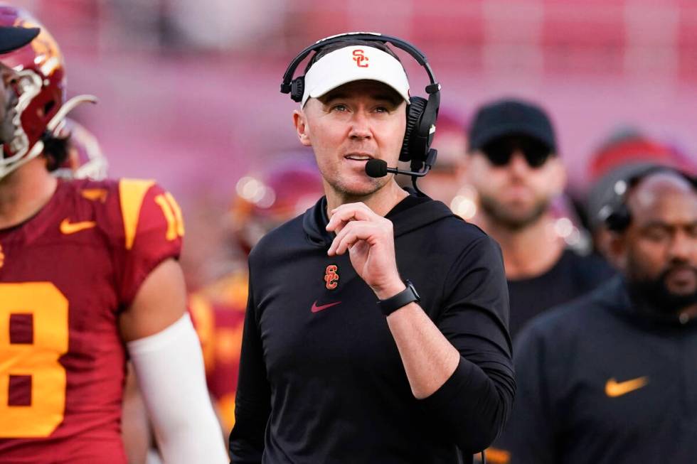 FILE - Southern California coach Lincoln Riley watches during the second half of the team's NCA ...