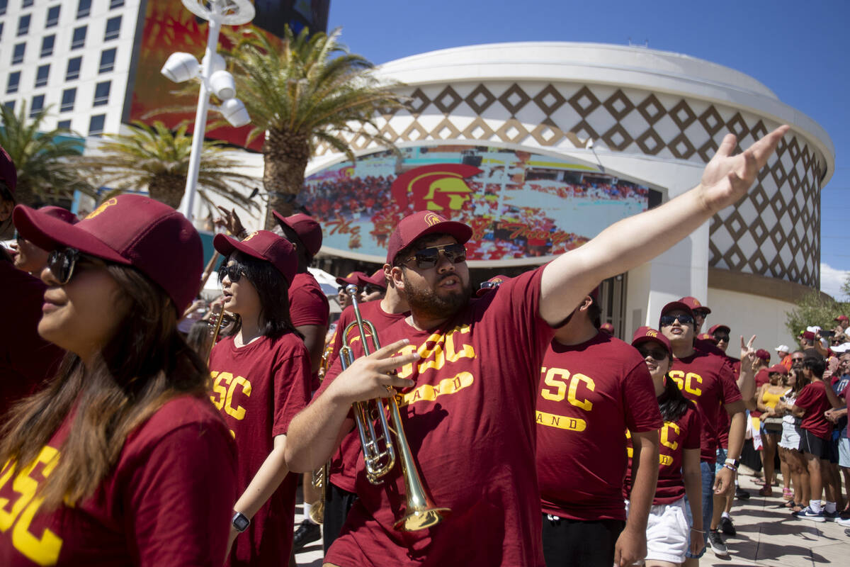 Members of the USC Trojan Marching Band make their entrance during the USC pep rally at The Pal ...