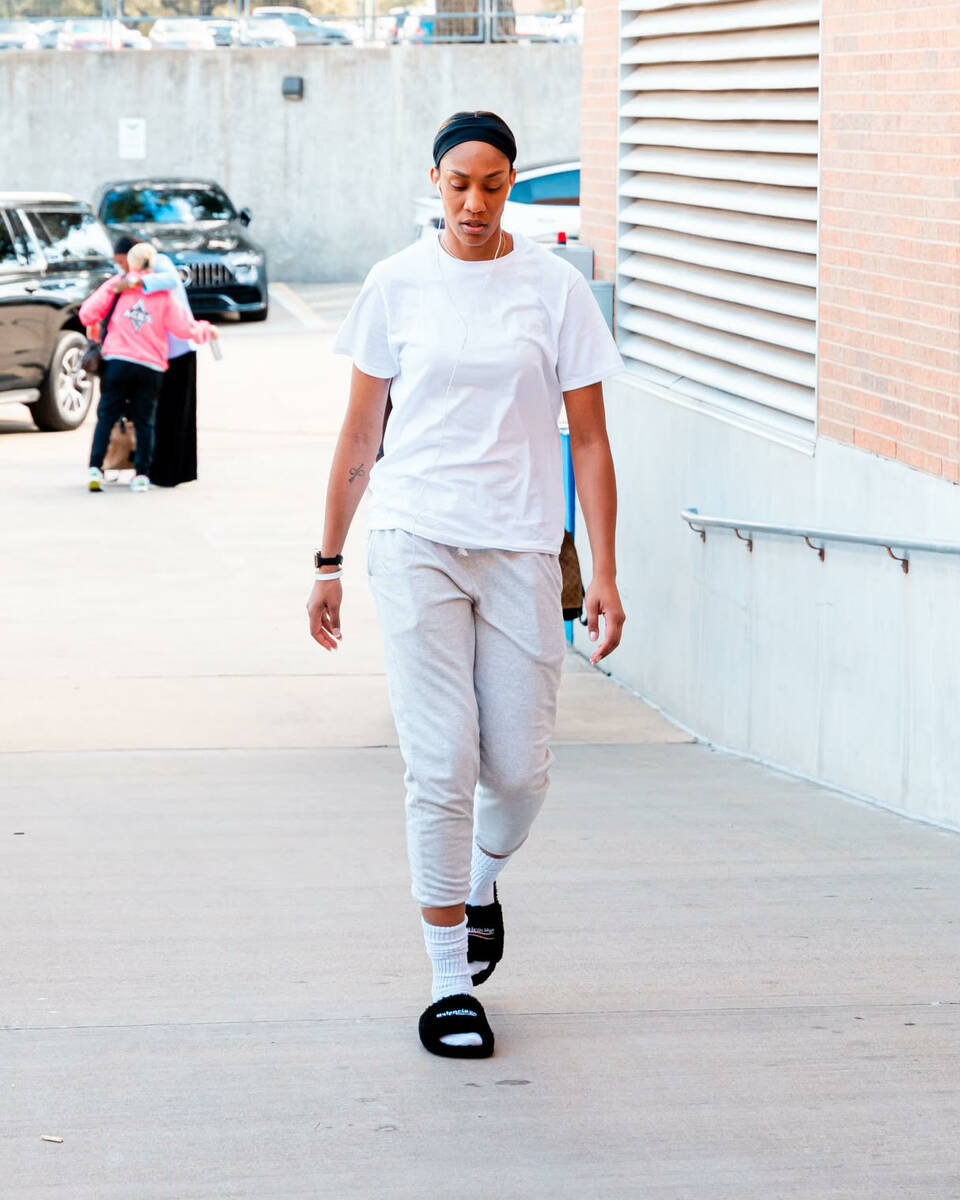 Aces forward A'ja Wilson has only been wearing white T-shirts into the arena lately instead of ...