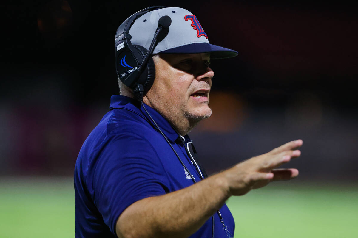 Liberty head coach Richard Muraco coaches from the sidelines during a Ninth Island Classic foot ...