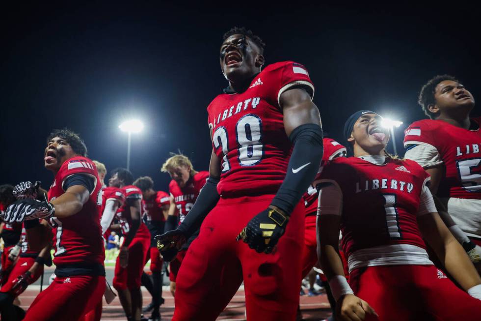 Liberty players perform a haka dance before a Ninth Island Classic football game between Milila ...