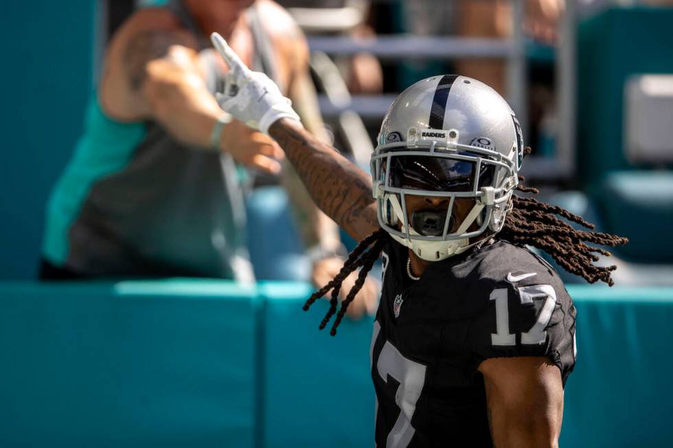 Raiders wide receiver Davante Adams (17) celebrates his touchdown score during the first half o ...