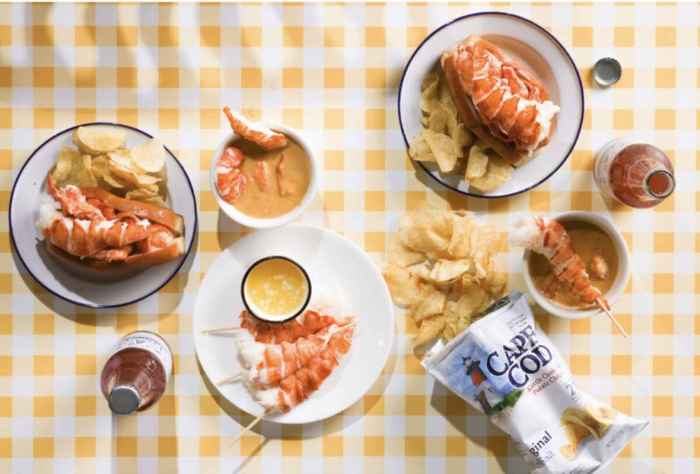 Lobster tails and lobster rolls with lobster tails on top from Luke's Lobster, which has two lo ...