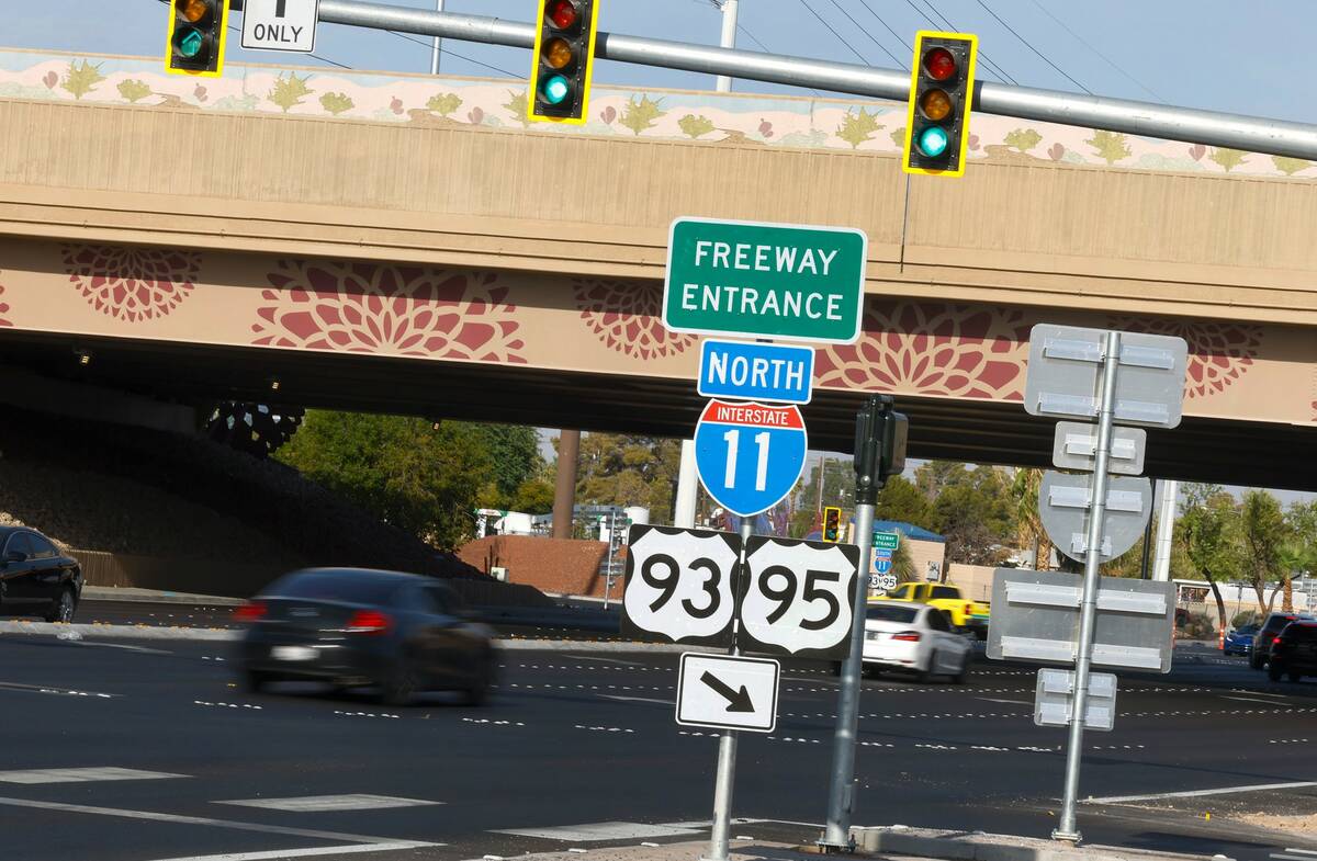 U.S. 93 and 95 signs are seen as motorists navigate on Charleston Boulevard, on Wednesday, Aug. ...