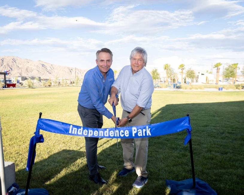 Clark County Commissioner Tick Segerblom and Touchstone Living’s Tom McCormick cut the ribbon ...