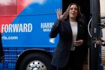 Democratic presidential nominee Vice President Kamala Harris waves as she exits her campaign bu ...