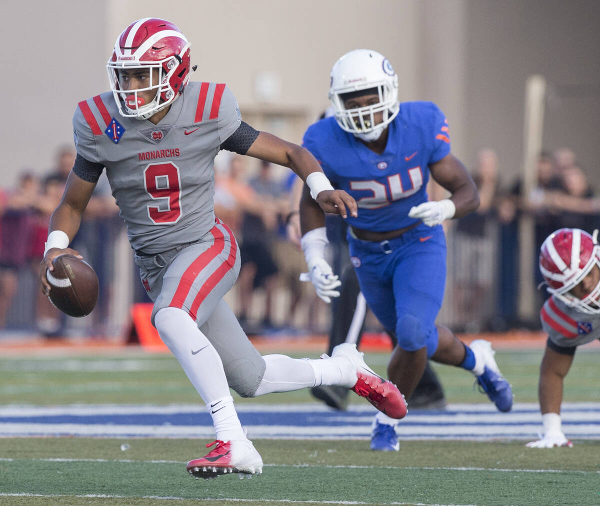 Mater Dei junior quarterback Bryce Young (9) sprints up field past Bishop Gorman junior linebac ...