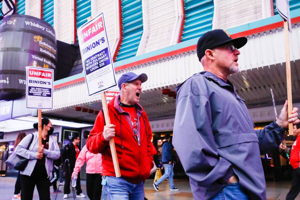 Members of the Culinary Local 226 picket outside Binion’s Gambling Hall & Hotel on Friday, Fe ...