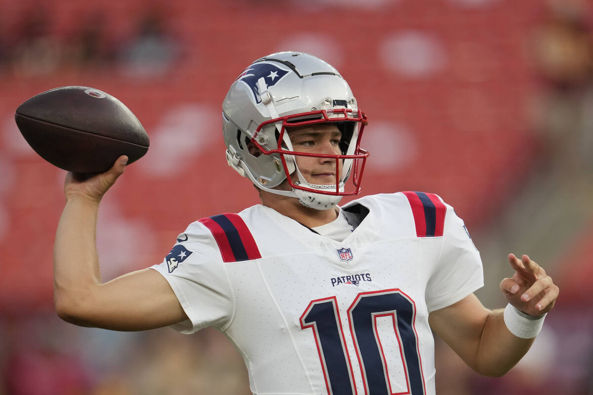 New England Patriots quarterback Drake Maye (10) before an NFL preseason football game against ...