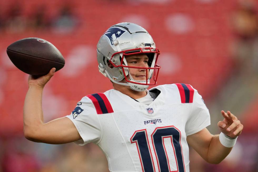 New England Patriots quarterback Drake Maye (10) before an NFL preseason football game against ...