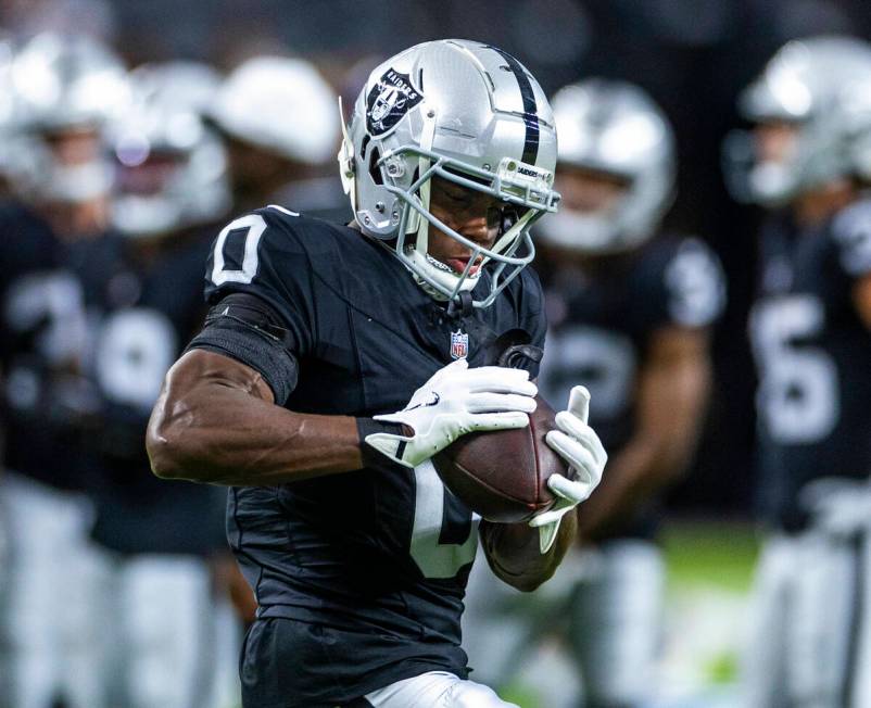 Raiders cornerback Jakorian Bennett (0) catches a pass as they face the Dallas Cowboys for thei ...