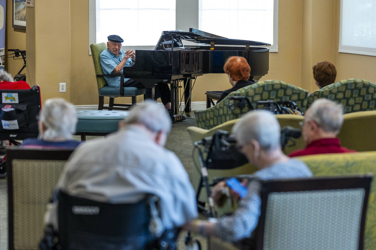 95-year-old pianist Don "Pops" Friend chats with his audience as he plays his finale ...