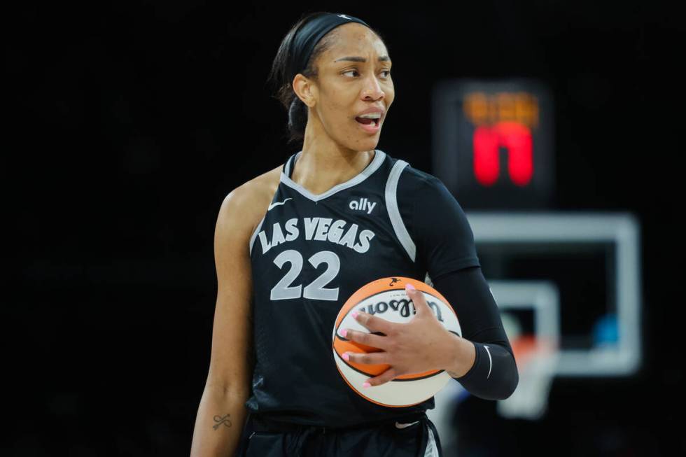 Aces center A'ja Wilson (22) reacts to a call by a referee during a WNBA basketball game betwee ...