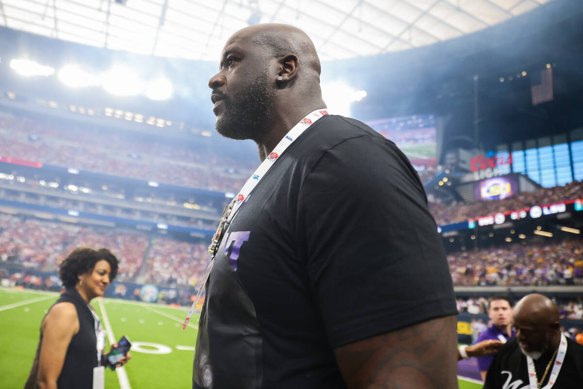 Shaquille O’Neal walks the LSU sidelines during the Vegas Kickoff Classic NCAA football ...