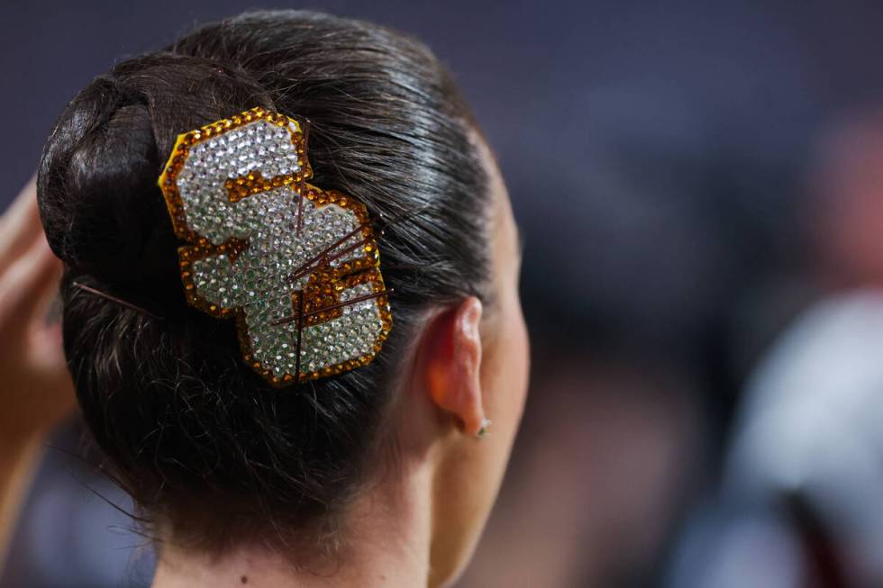 A Southern California baton twirler watches game action during the Vegas Kickoff Classic NCAA f ...