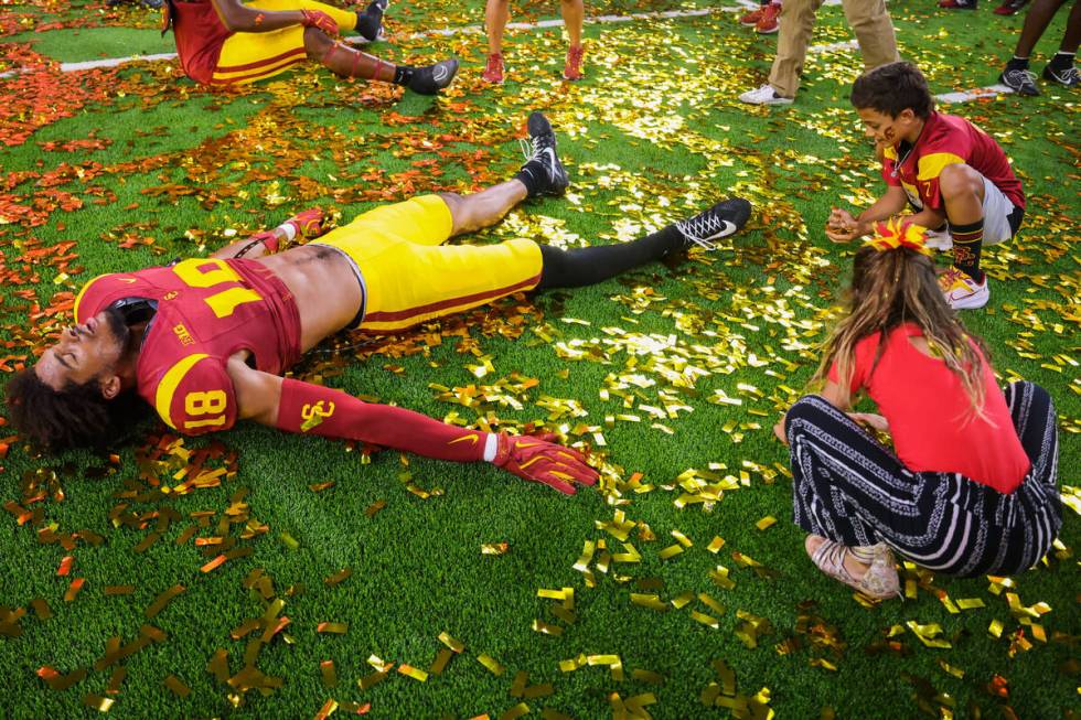 Southern California linebacker Eric Gentry celebrates winning the Vegas Kickoff Classic NCAA fo ...