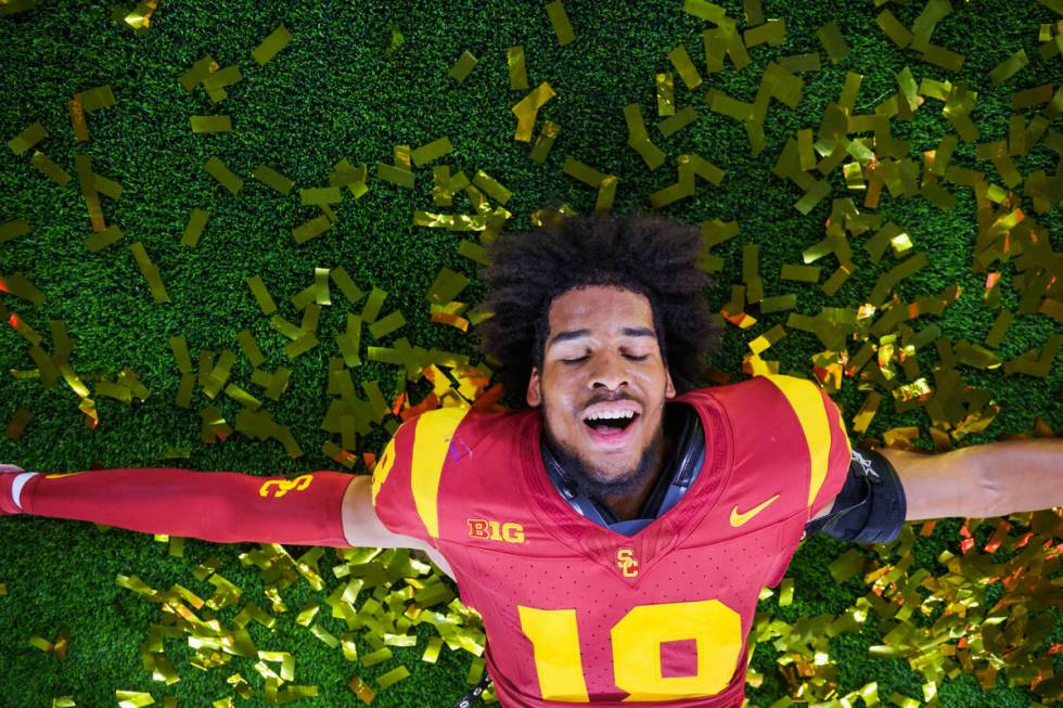 Southern California linebacker Eric Gentry celebrates winning the Vegas Kickoff Classic NCAA fo ...