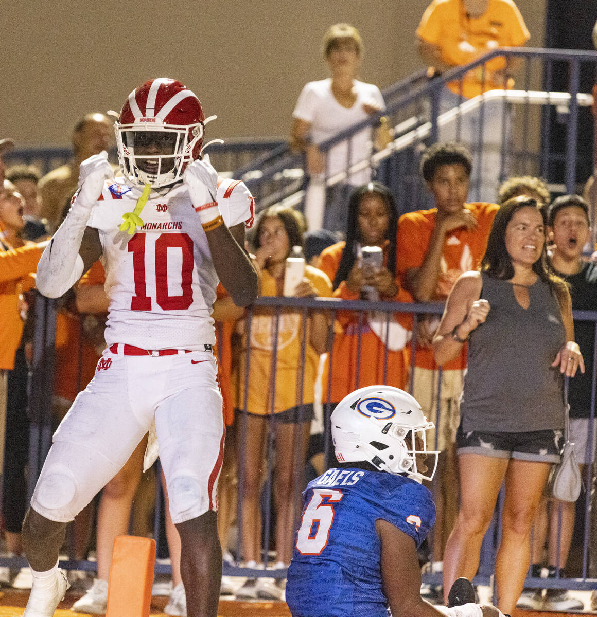 Mater Dei's wide receiver Marcus Harris (10) celebrates his touchdown as Bishop Gorman's defen ...