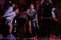 Aces center A'ja Wilson makes her way onto the court for introductions during a WNBA basketball ...