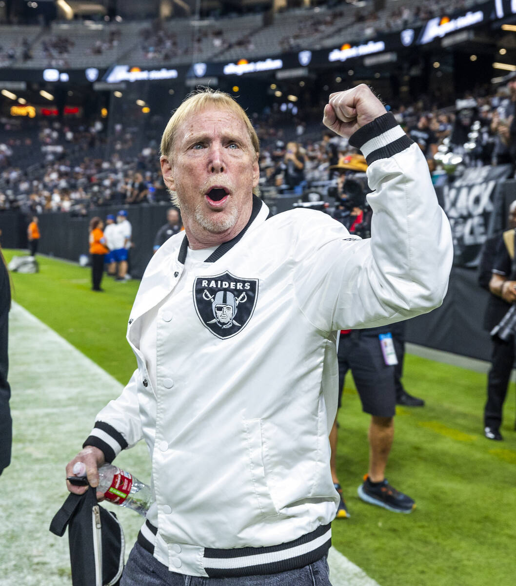 Raiders owner Mark Davis cheers with the crowd during warm ups before the first half of their N ...