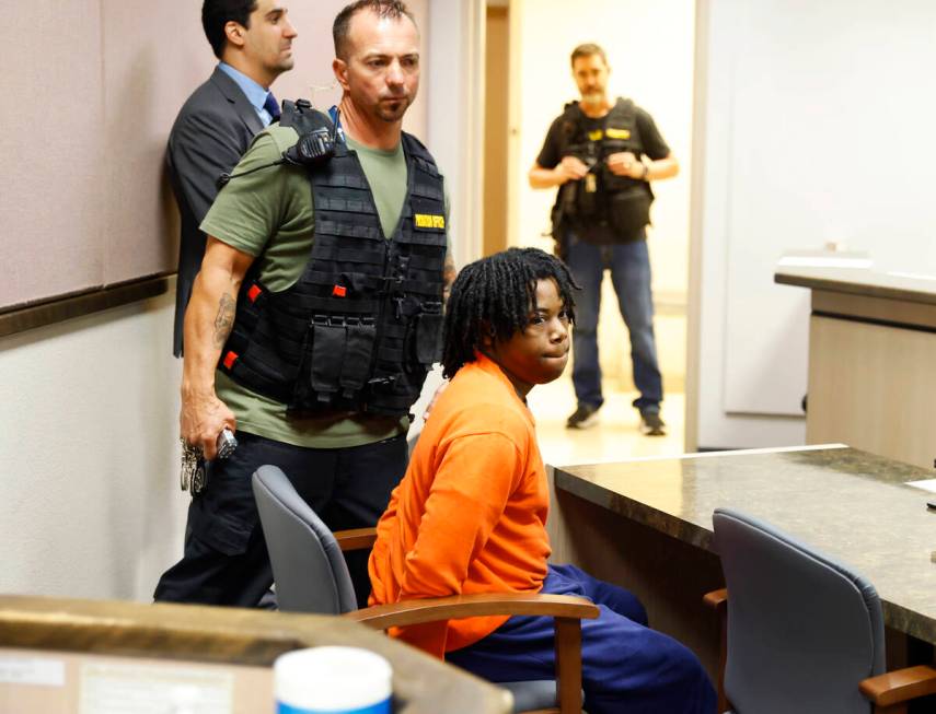 Gianni Robinson appears in Clark County Family Court during a hearing on Tuesday, Sept. 3, 2024 ...