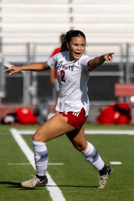 Liberty senior Natalie Collins (2) directs her teammates during the high school girls soccer ma ...