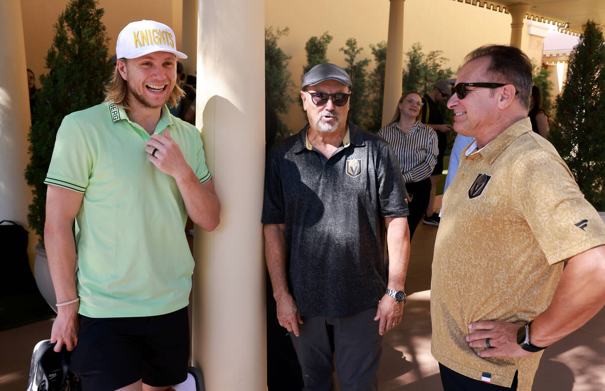 Vegas Golden Knights center William Karlsson, left, mingles with retired Las Vegas police offic ...