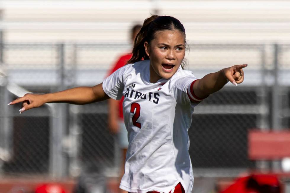 Liberty senior Natalie Collins (2) directs her teammates during the high school girls soccer ma ...