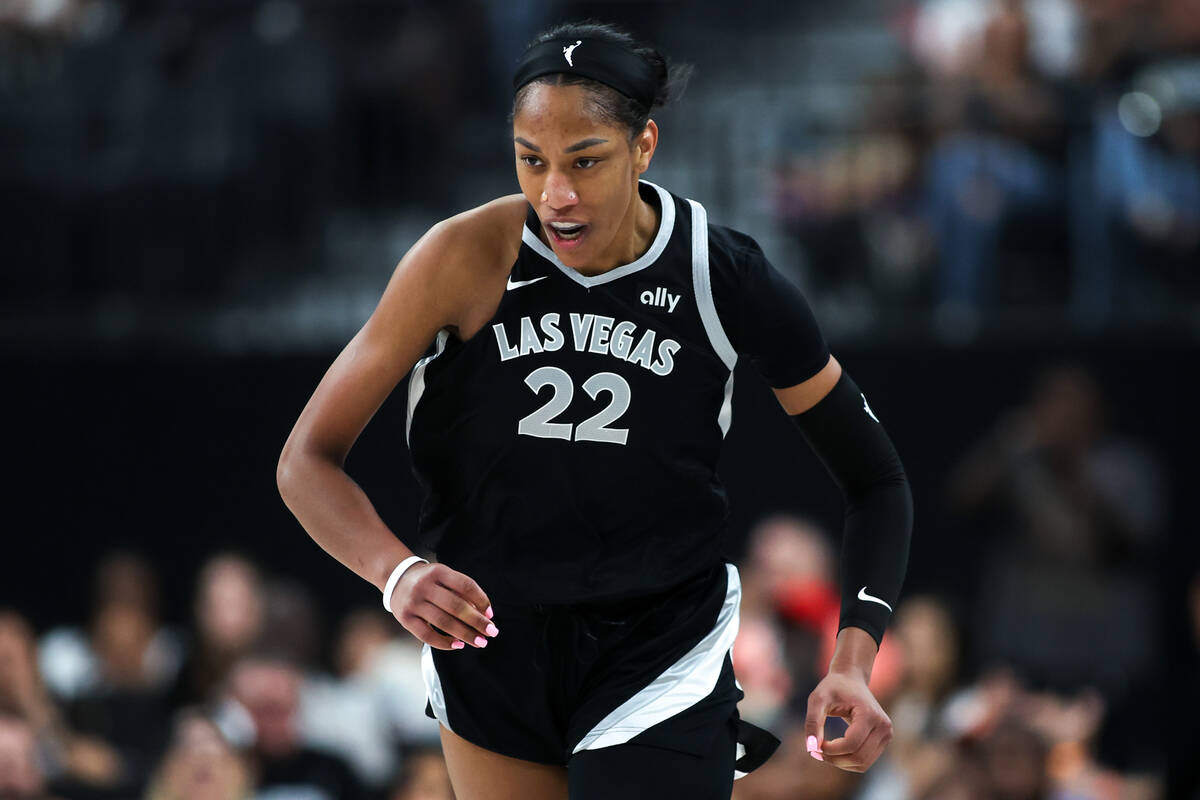 Las Vegas Aces center A'ja Wilson (22) reacts after scoring a three-point basket during the fir ...