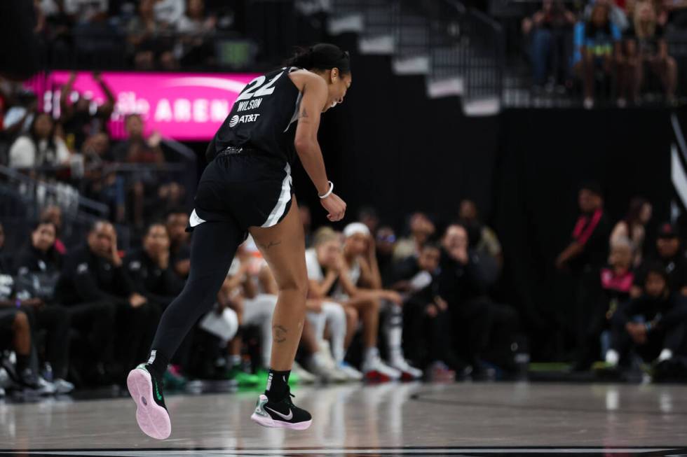 Las Vegas Aces center A'ja Wilson (22) celebrates after scoring during the second half of a WNB ...