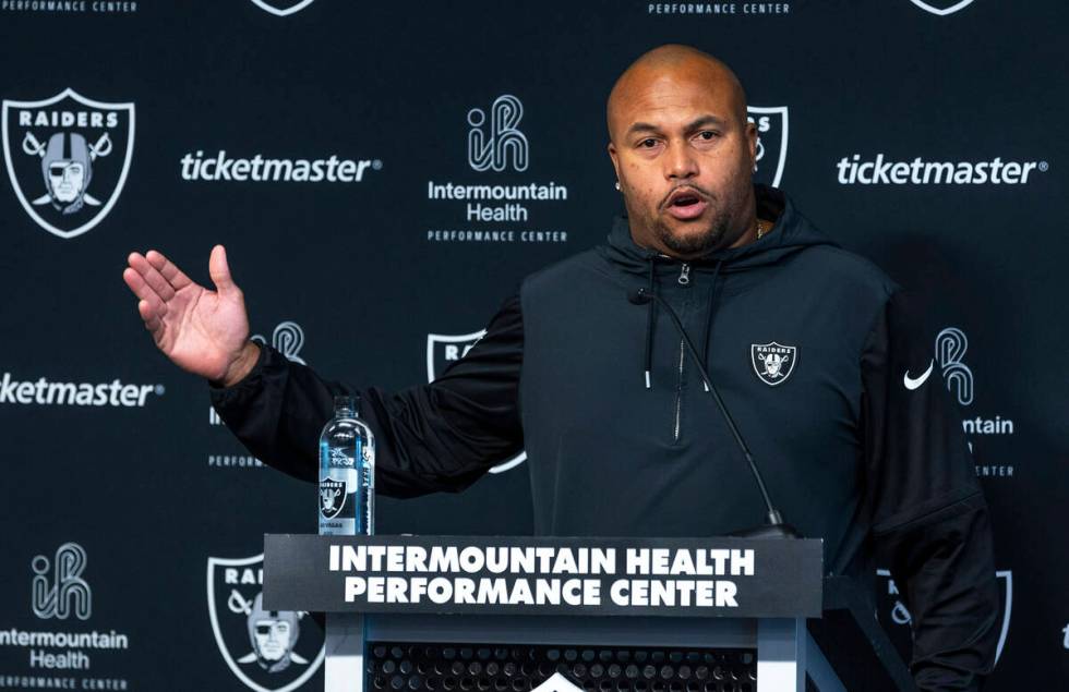 Raiders head coach Antonio Pierce answers a media question before practice at the Intermountain ...