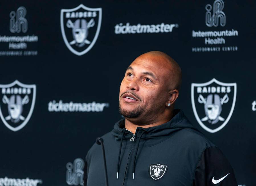 Raiders head coach Antonio Pierce considers a media question before practice at the Intermounta ...