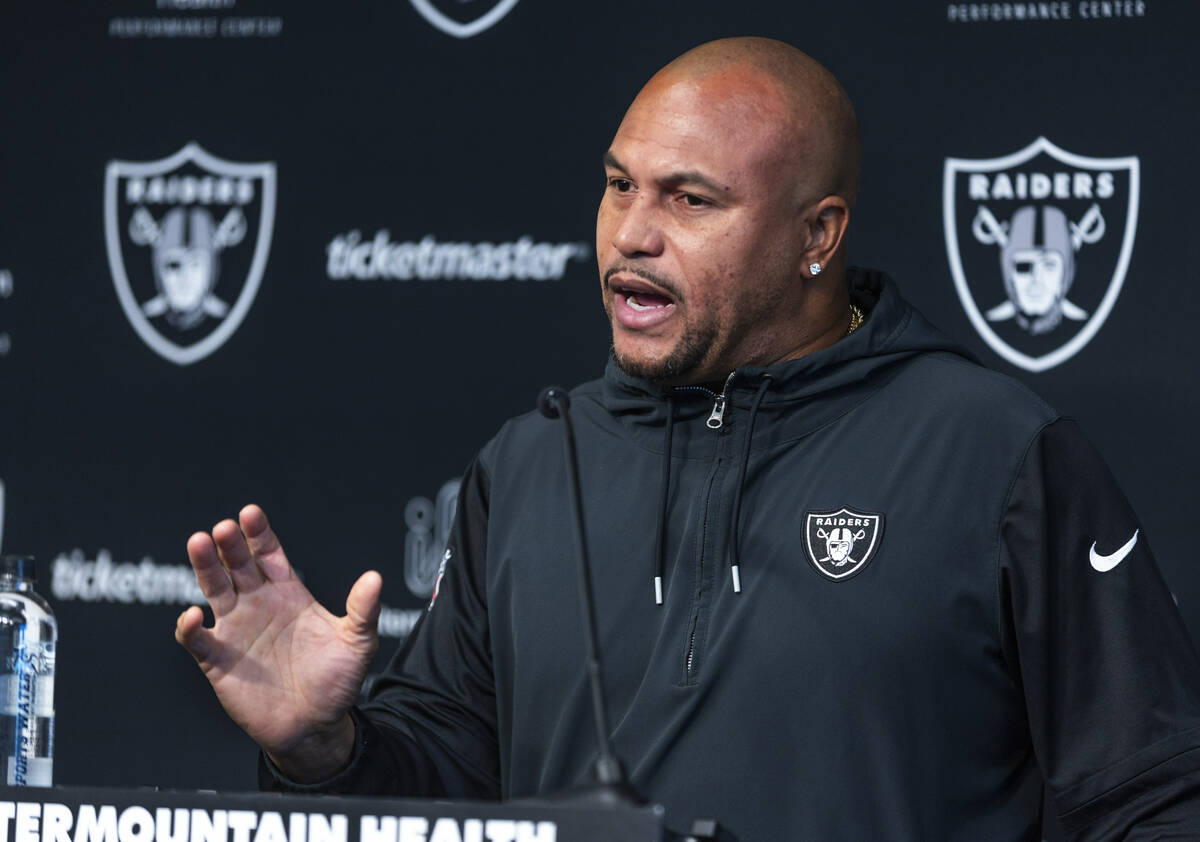 Raiders head coach Antonio Pierce answers a media question before practice at the Intermountain ...