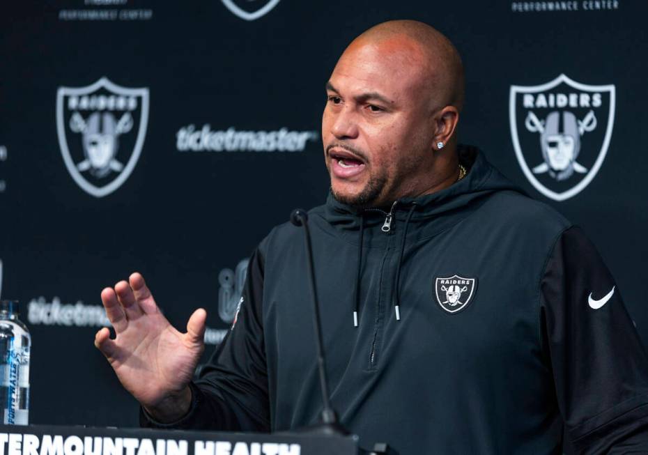 Raiders head coach Antonio Pierce answers a media question before practice at the Intermountain ...