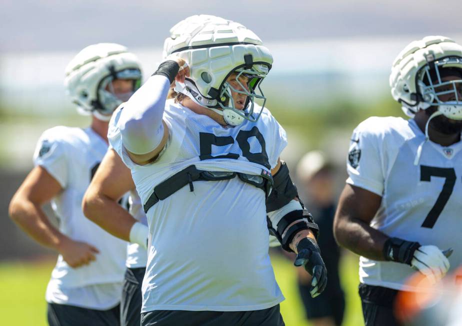 Raiders guard Jackson Powers-Johnson (58) readies for a drill during practice at the Intermount ...