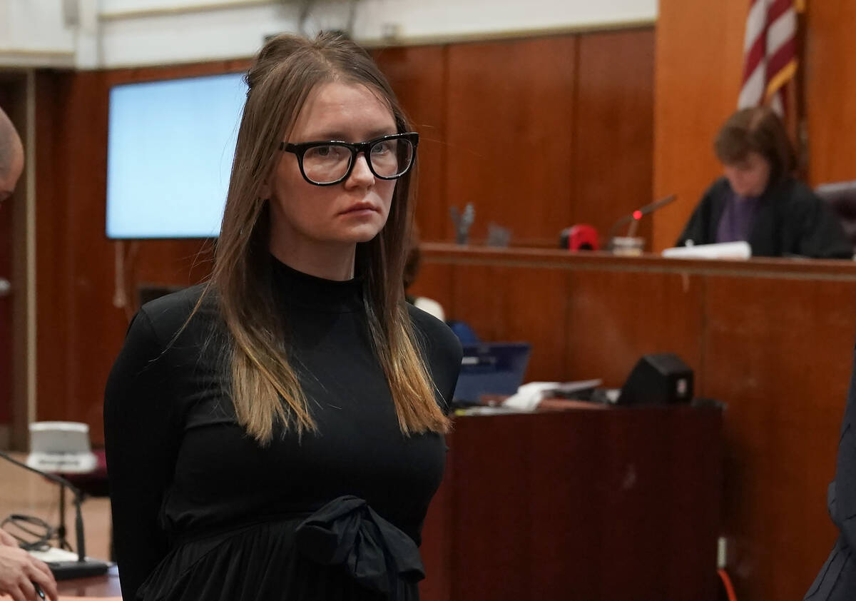 Fake German heiress Anna Sorokin, also known as Anna Delvey, is led away after being sentenced ...