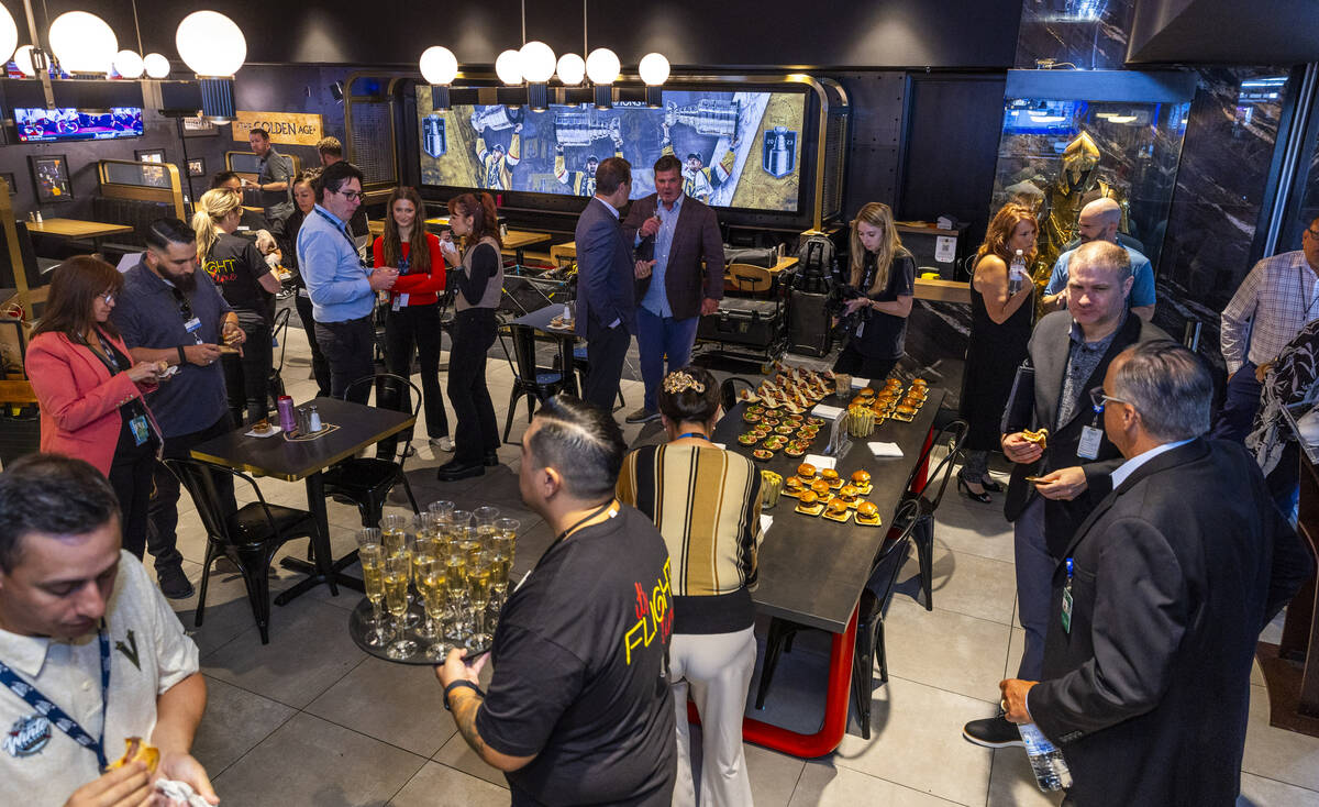 Guests enjoy the new space during the grand opening celebration for the Vegas Born Restaurant i ...