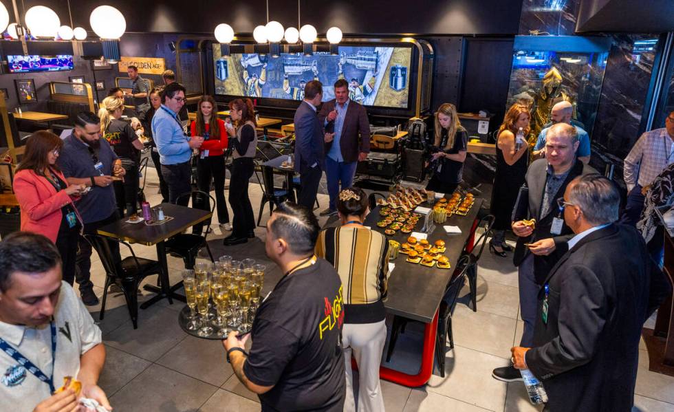 Guests enjoy the new space during the grand opening celebration for the Vegas Born Restaurant i ...