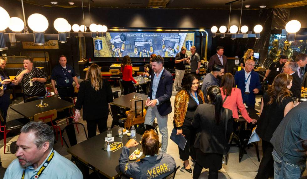 Guests enjoy the new space during the grand opening celebration for the Vegas Born Restaurant i ...