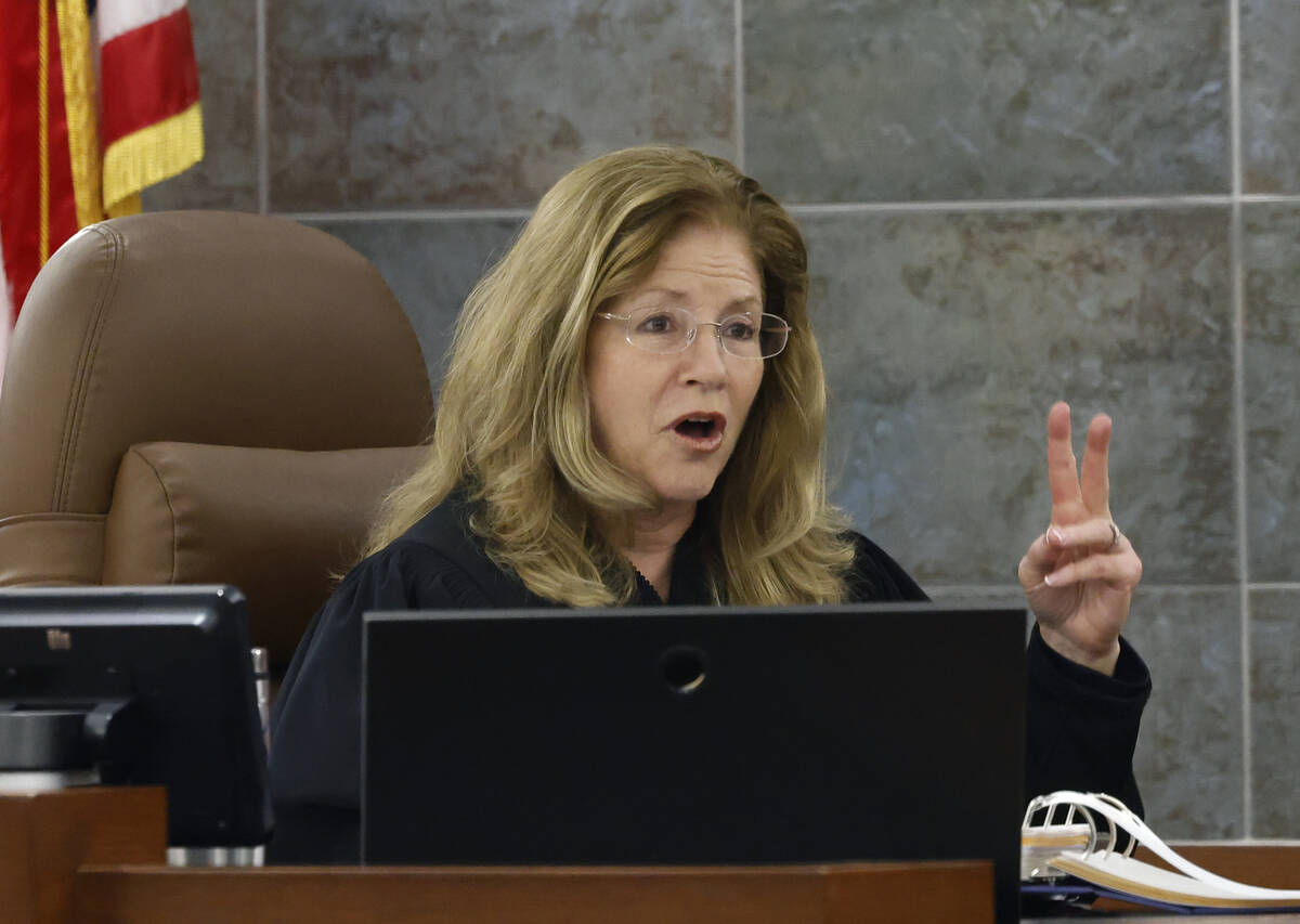 Judge Susan Johnson instructs the jury during Deobra Redden's, who was captured on video attack ...