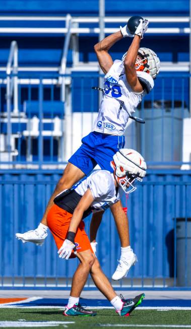 Bishop Gorman wide receiver Derek Meadows (30) elevates for a catch during football practice on ...